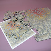 A Post Truth Puzzle 100 Piece Jigsaw Puzzle in Tin | Sara Impey