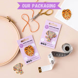 Scissors needle minder