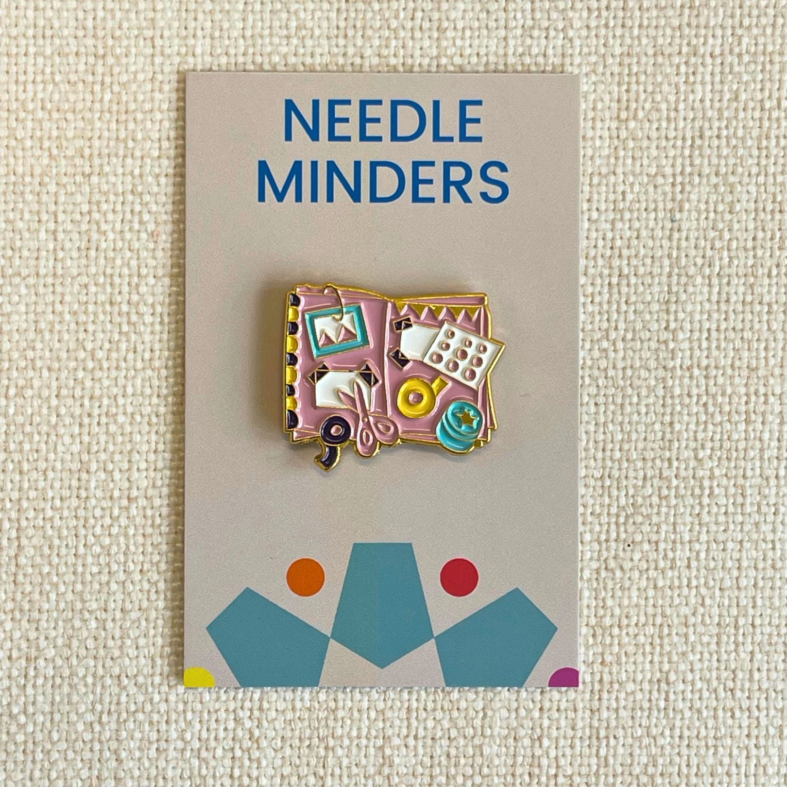 Crafting book needle minder